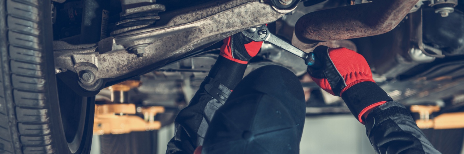 mechanic performing a drivetrain service